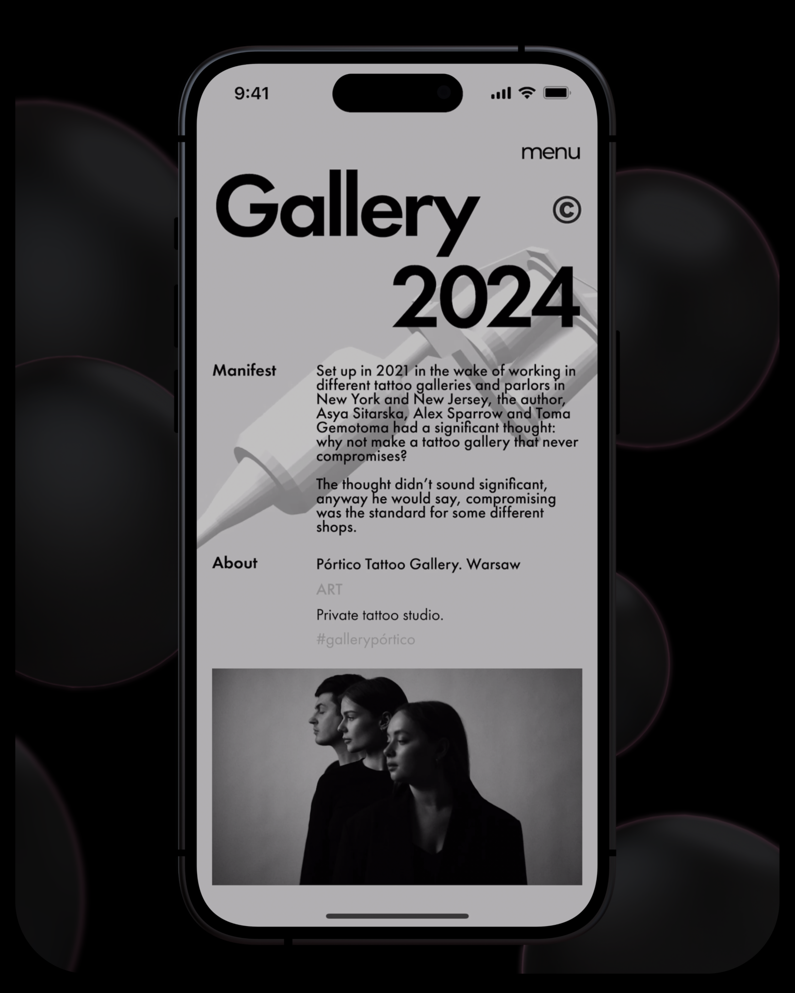 Phone showing a gallery page with manifesto text, studio details and team photo