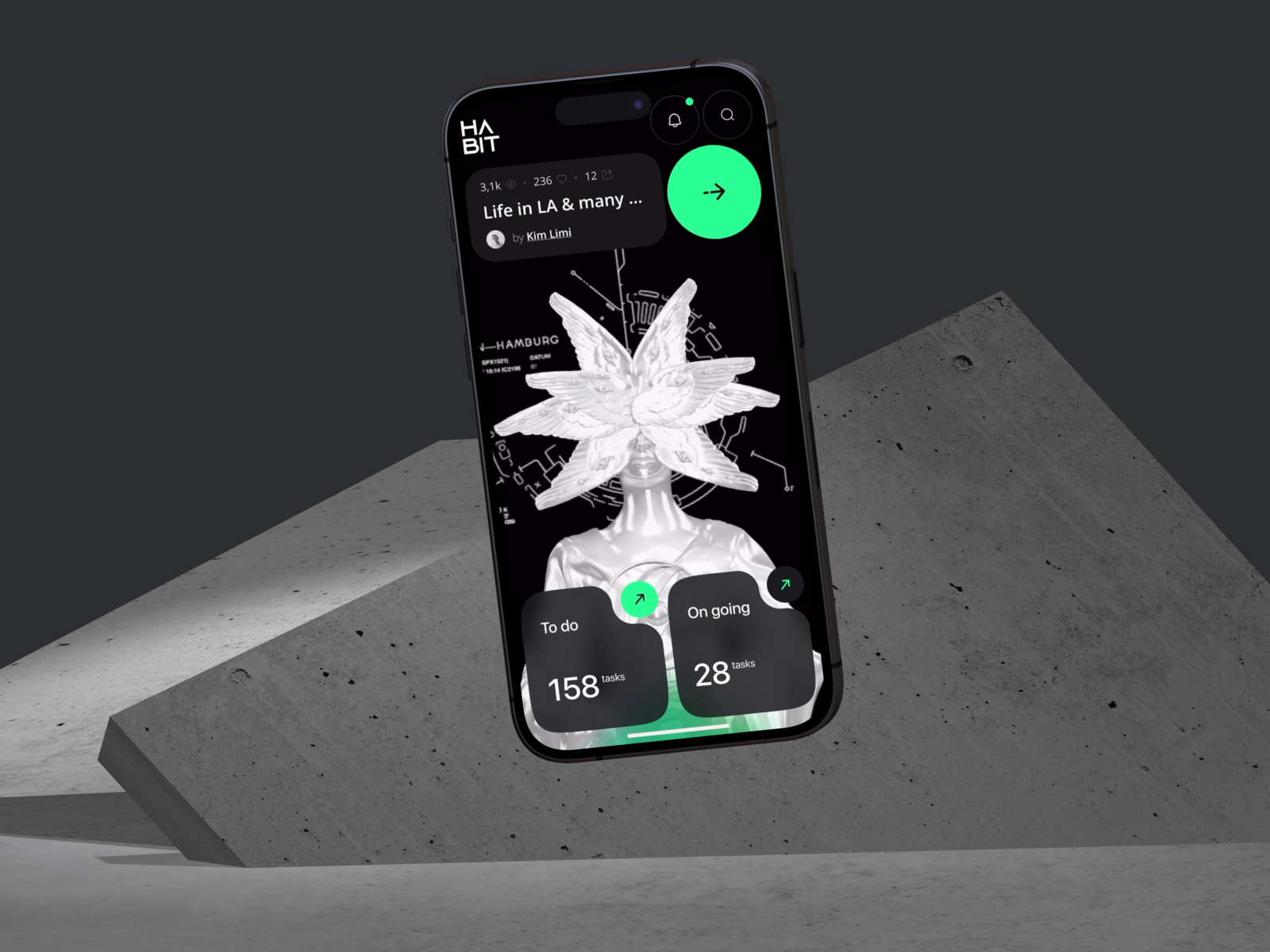 Phone over concrete showing a story card, task counters and a chrome figure