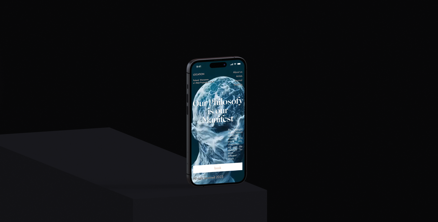 Phone on a plinth with a manifesto page over a water-sculpted head