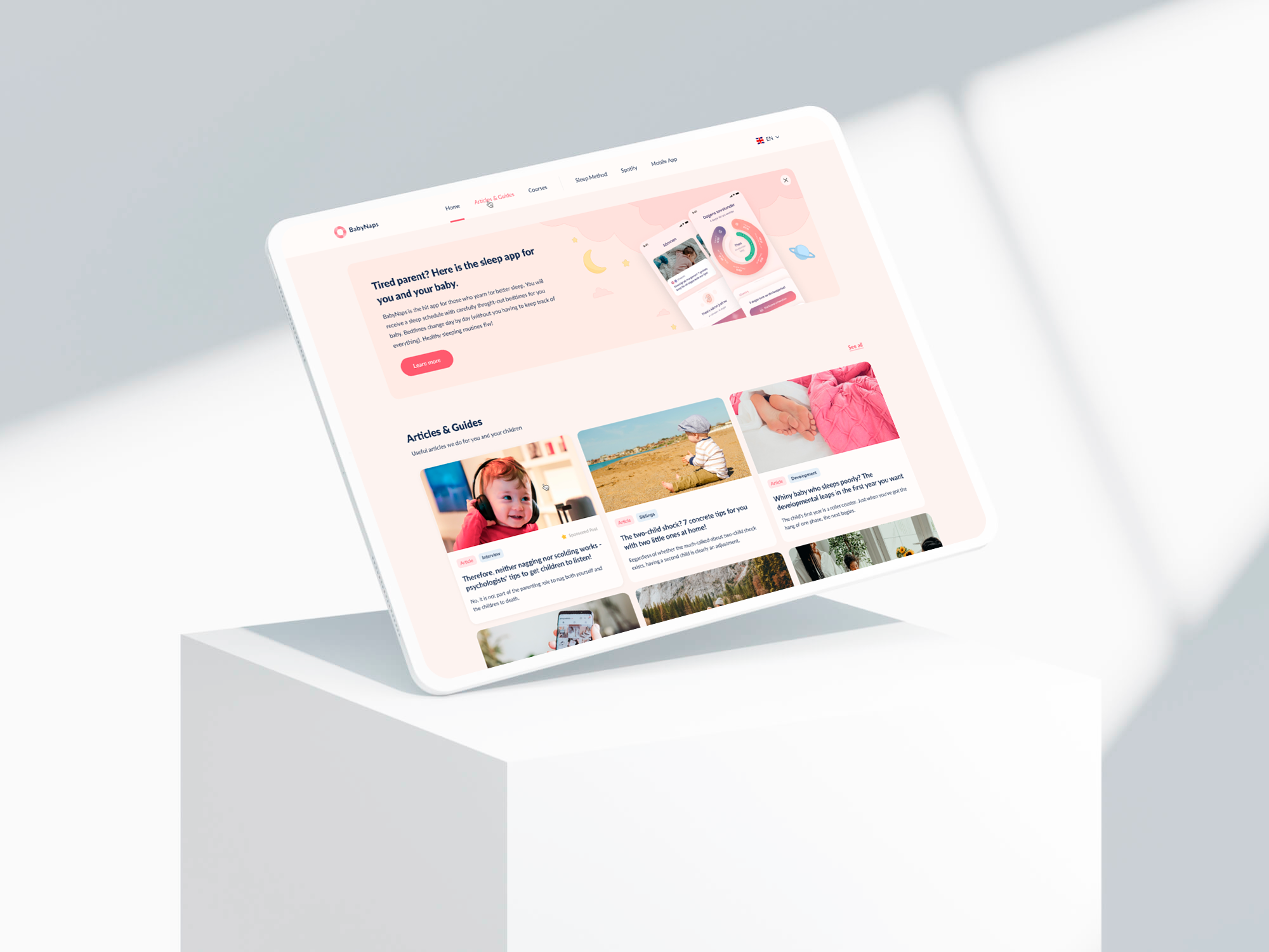 Tablet view of the website hero and a grid of parenting articles